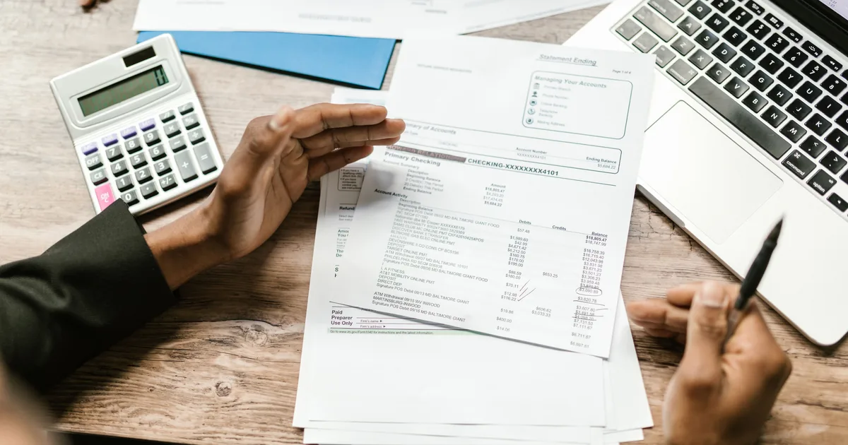 Person checking credit score on mobile app after Alphaeon Credit application